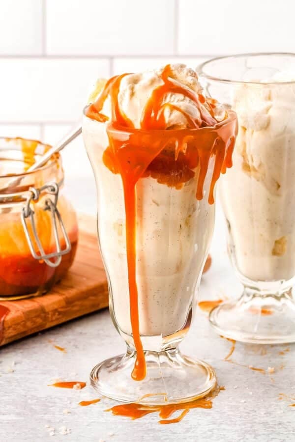 Vanilla ice cream with salted caramel on it.