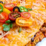 A close up picture of the baked chicken enchilada casserole.