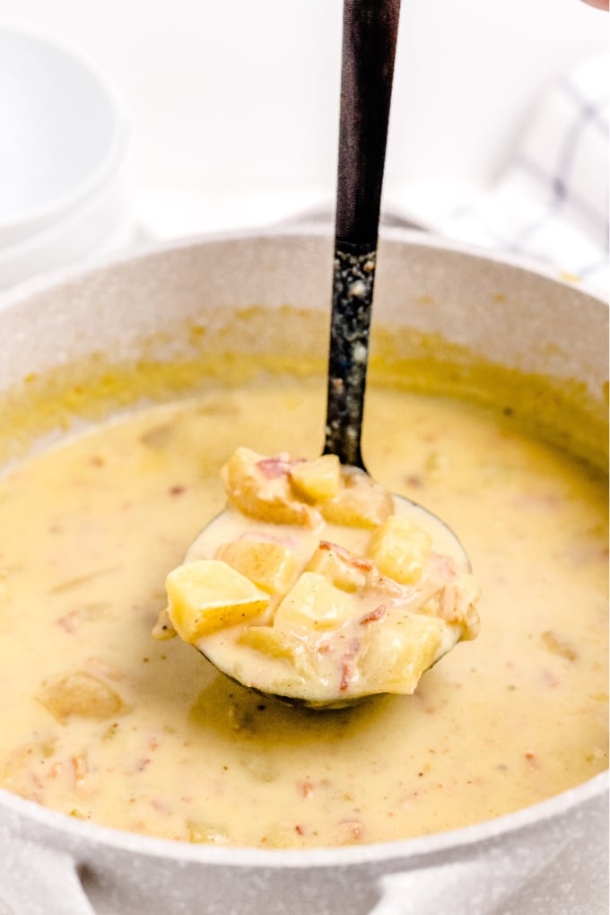 This Thick and Creamy Potato Soup recipe is the definition of comfort food! It’s made with golden potatoes, bacon, half-and-half, and seasonings.  via @foodfolksandfun