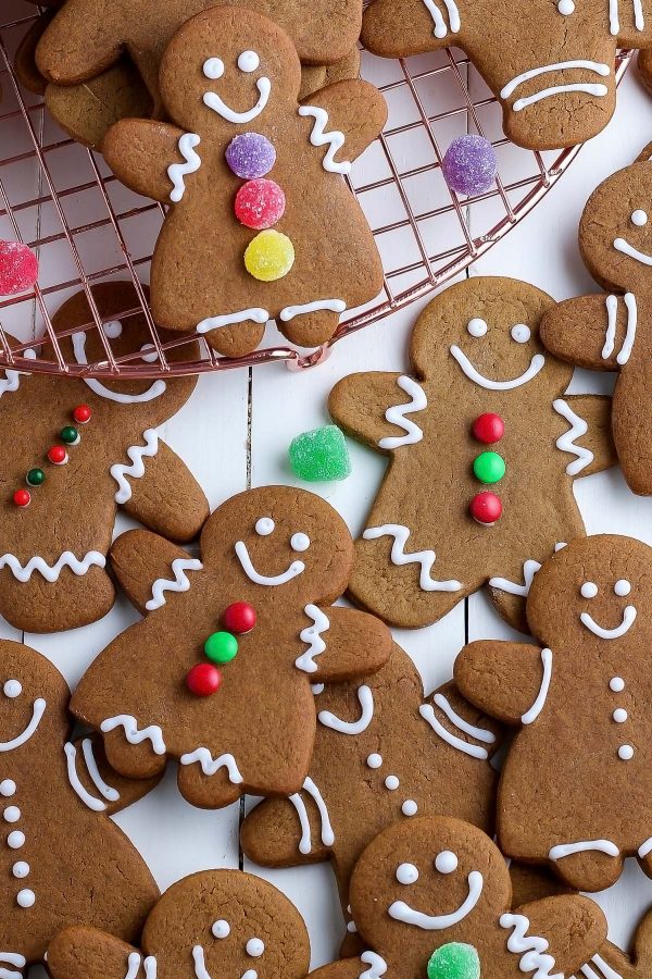 An overhead picture of decorated gingerbread cookies. 