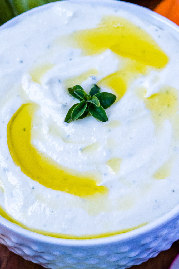 This Whipped Feta Dip is a creamy mezze dip that is tangy, salty, and best served with veggies and pita chips. The best part is that it takes just 5 minutes to make! via @foodfolksandfun