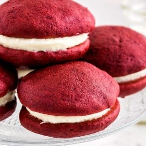 A close up picture of 3 whoopie pies stacked on each other.