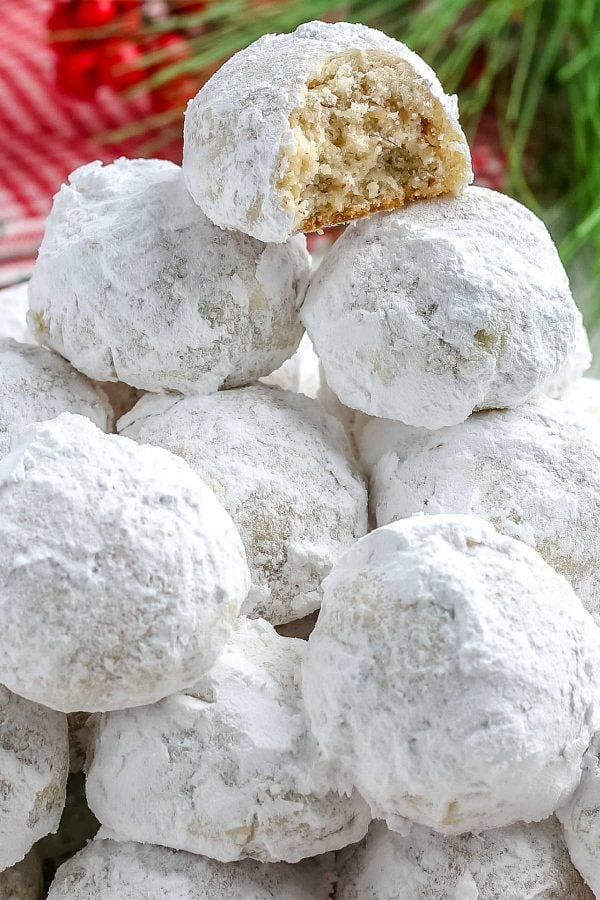 A close up picture of a pile of snowball cookies. 
