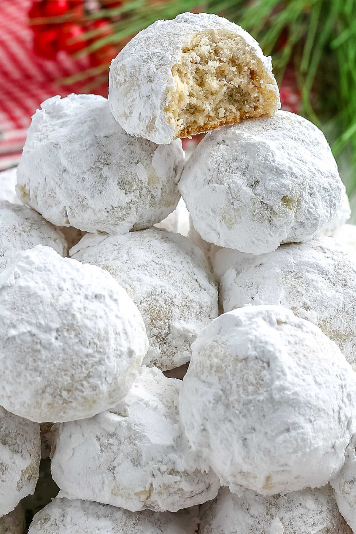 Pecan Snowball Cookies are soft, tender cookies that melt in your mouth. Kids love rolling the cookies in snowy white powdered sugar.  via @foodfolksandfun