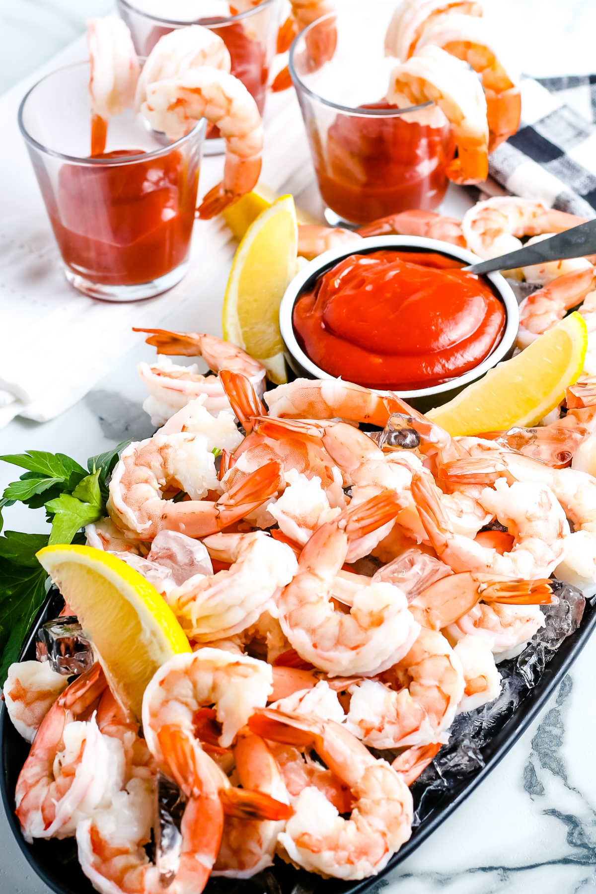 This Shrimp Cocktail and Shrimp Cocktail Sauce recipes are party staples. Making homemade shrimp cocktail is so easy, and it will save you money! via @foodfolksandfun