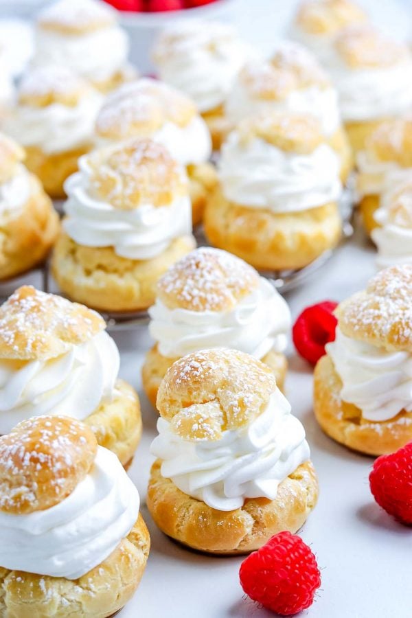 The finished Cream Puffs on a white serving platter. 