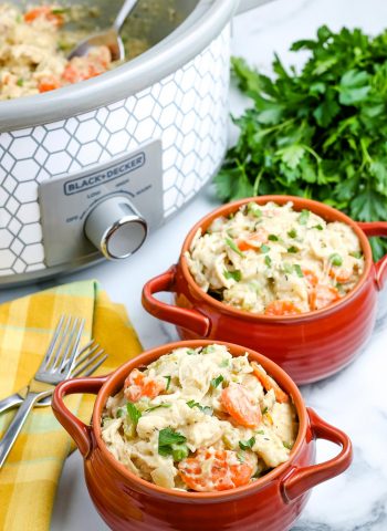 Two bowls full of this Crockpot Chicken and Dumplings recipe.