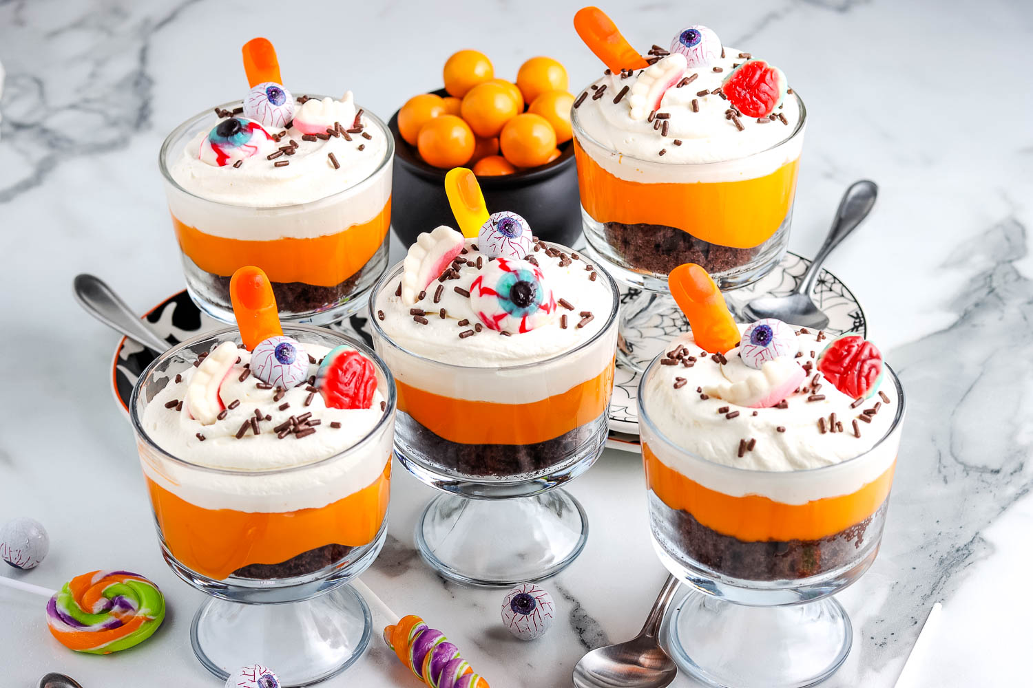 Five mini Halloween Chocolate Trifles in clear trifle dishes.