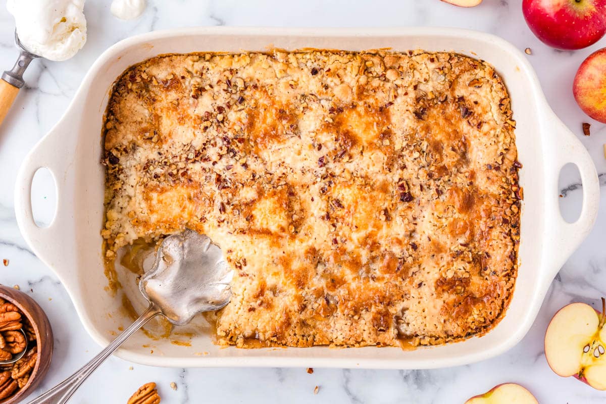 The finished dump cake in a white baking dish.