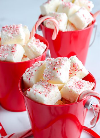 White Chocolate Peppermint Fudge in red mugs.