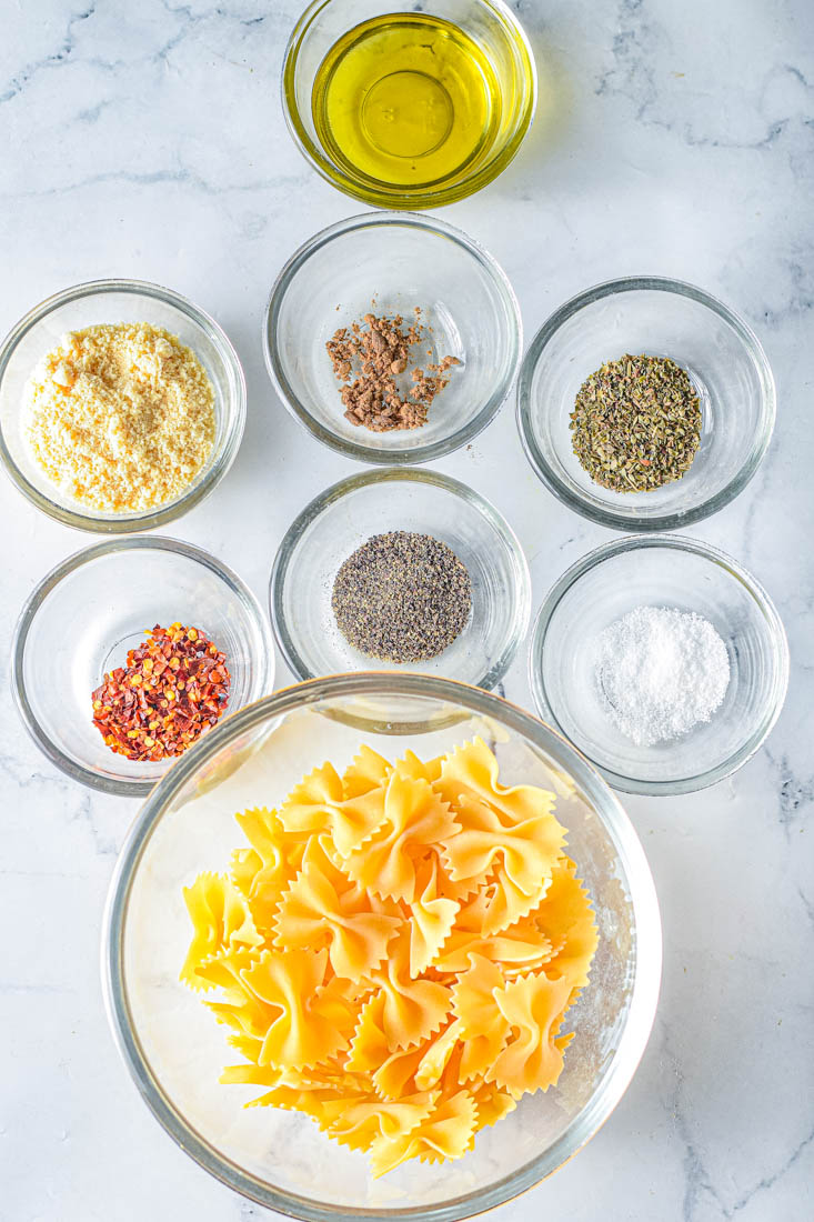 An overhead picture of all of the ingredients needed to make this Air Fryer Pasta Chips recipe.