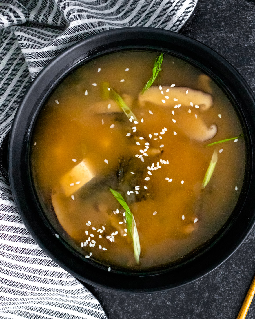 An overhead picture of the finished Miso Soup Without Dashi in a black bowl.