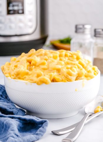 The finished Instant Pot Velveeta Mac and Cheese in a white serving bowl.