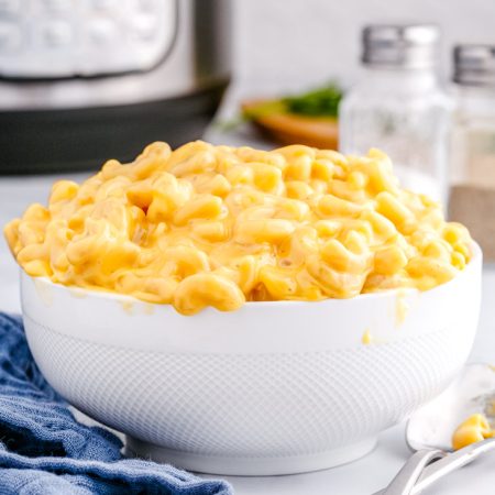 The finished Instant Pot Velveeta Mac and Cheese in a white serving bowl.