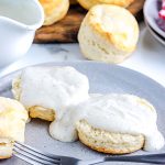 Country white gravy poured over split buttermilk biscuits.