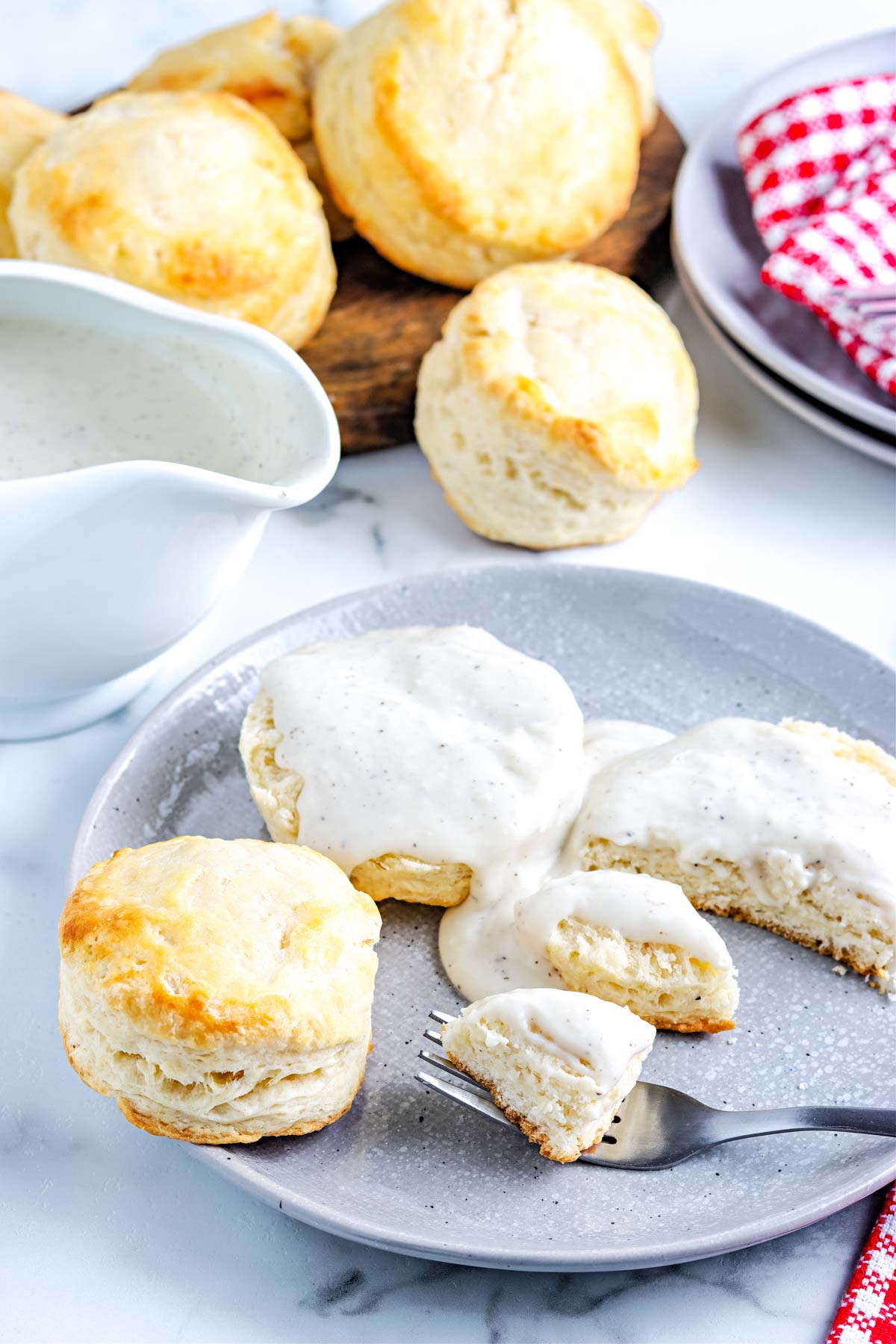 The finished White Gravy poured over biscuits.