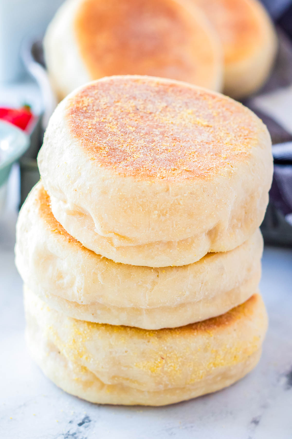 A stack of three Homemade English Muffins.
