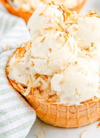 A close up picture of the finished Toasted Coconut Ice Cream in a waffle bowl.