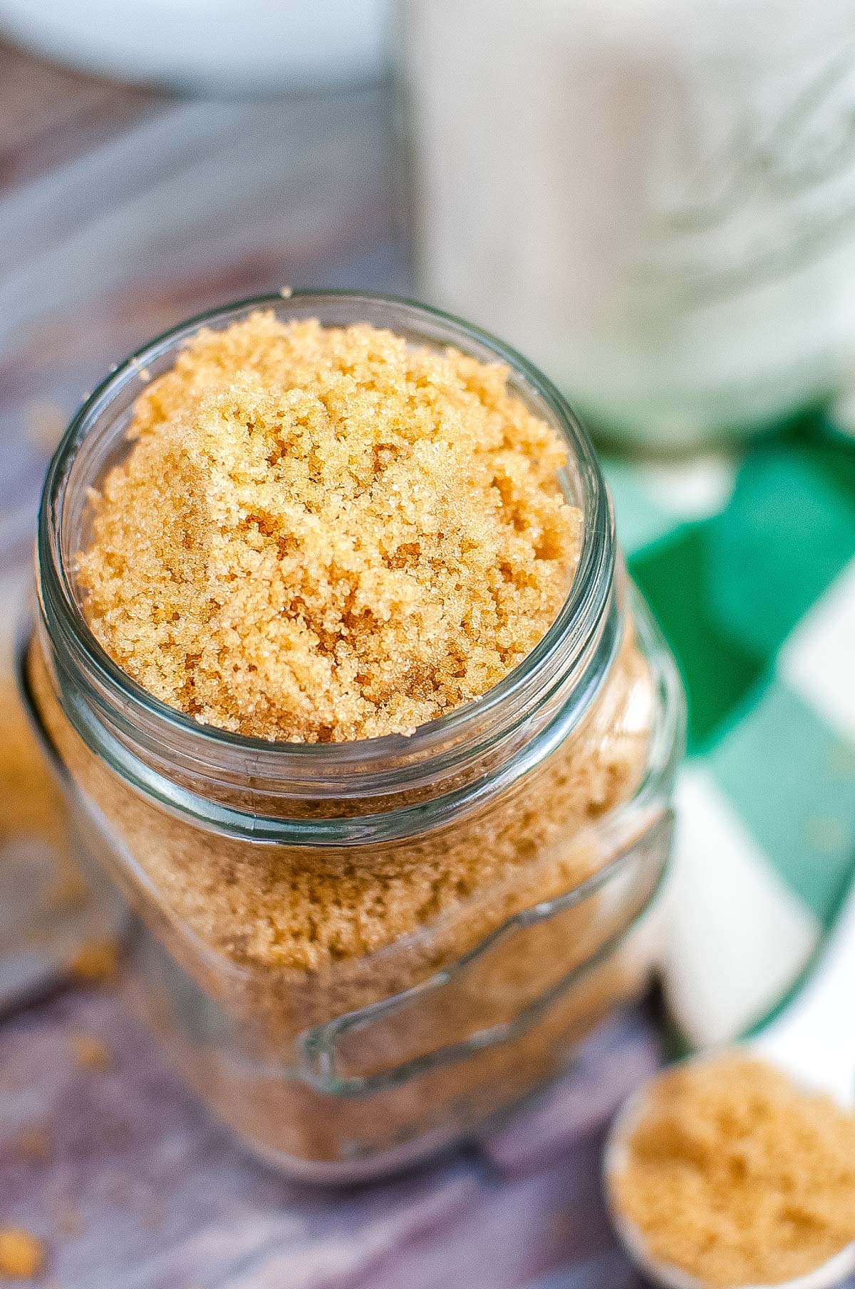 A closeup, overhead picture of the finished brown sugar in a glass storage jar.