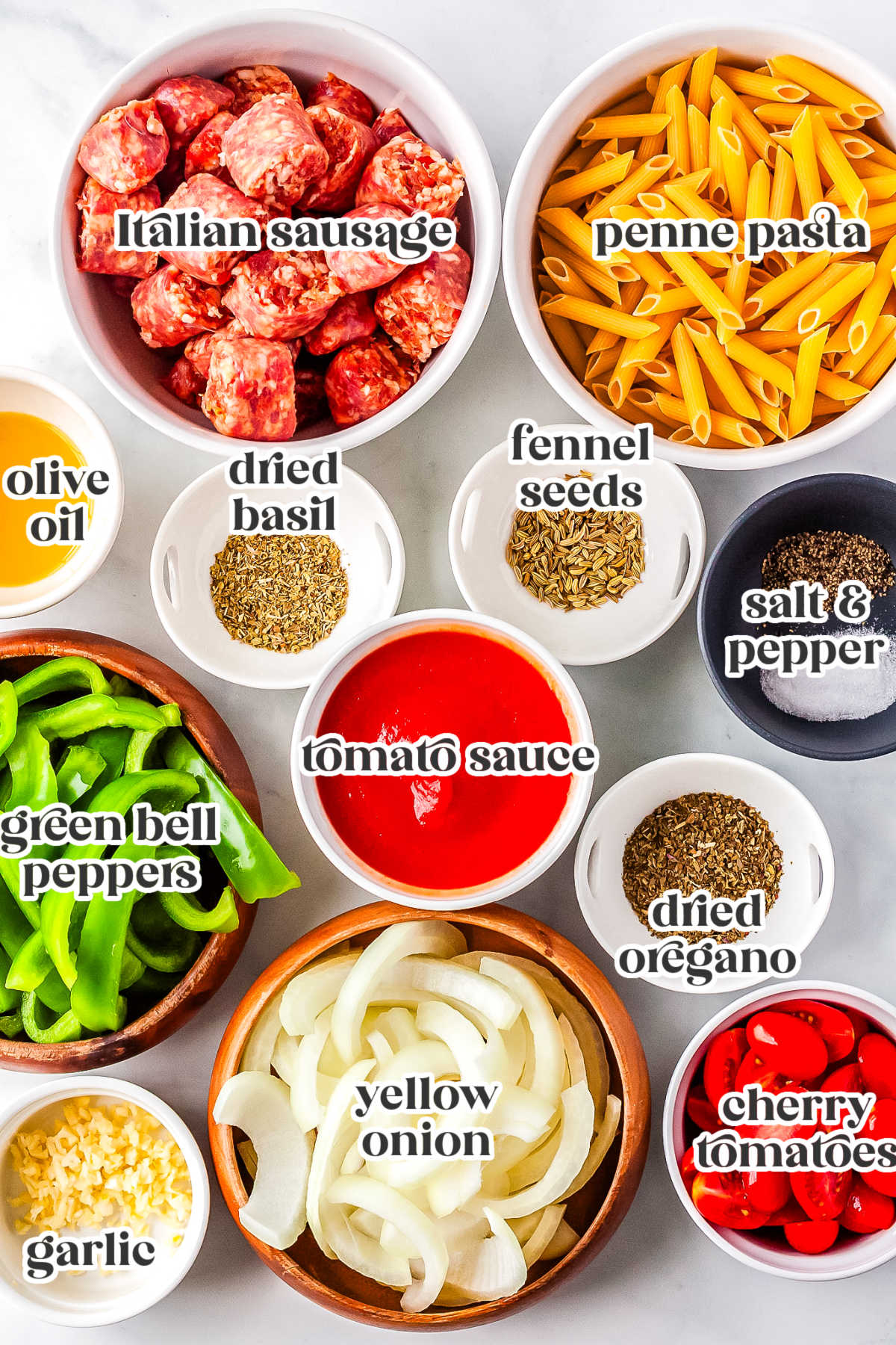 The sausage and peppers pasta ingredients with text overlay labeling each one.
