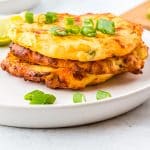 The finished Air Fryer Mashed Potato Pancakes on a white plate.