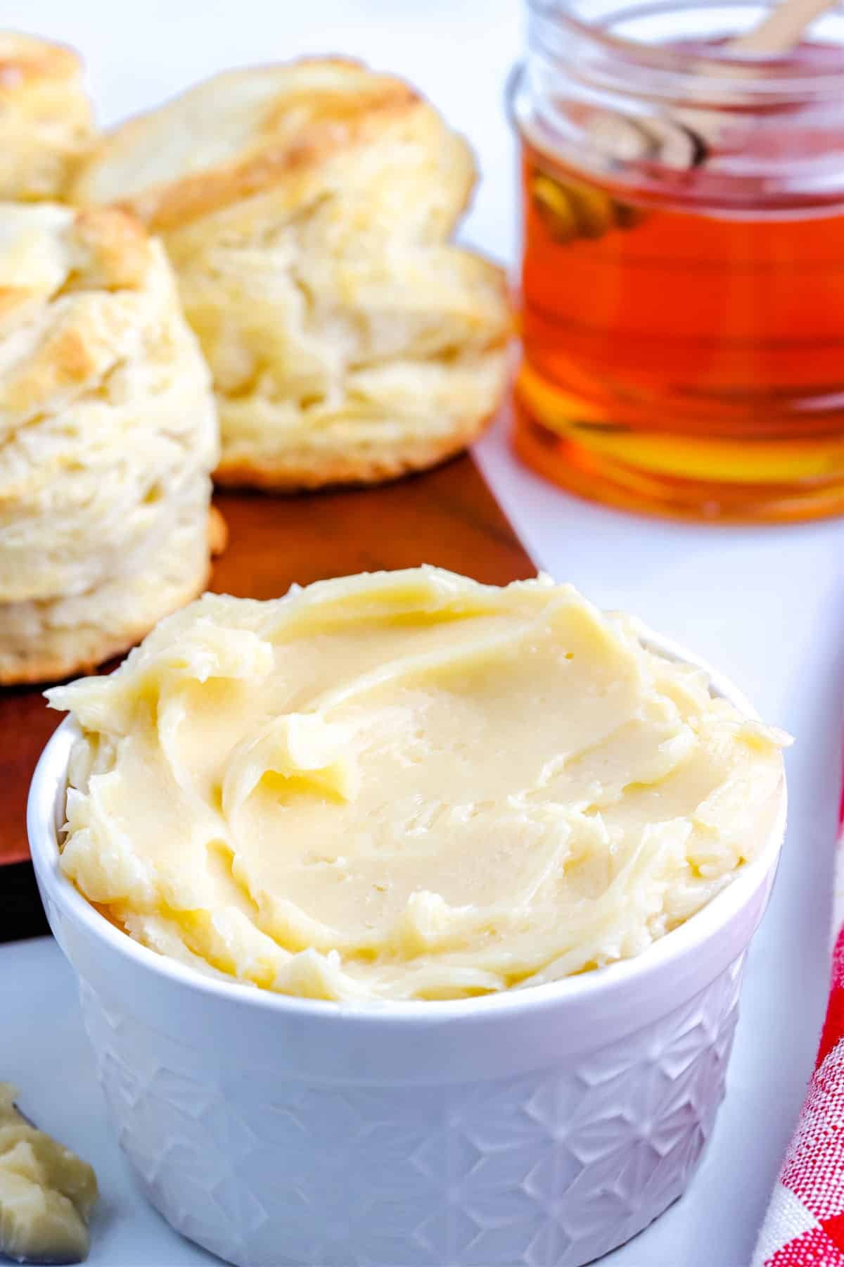 The Whipped Honey Butter recipe in a white serving dish.