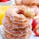 A close up picture of a stack of Old Fashioned Sour Cream Donuts.