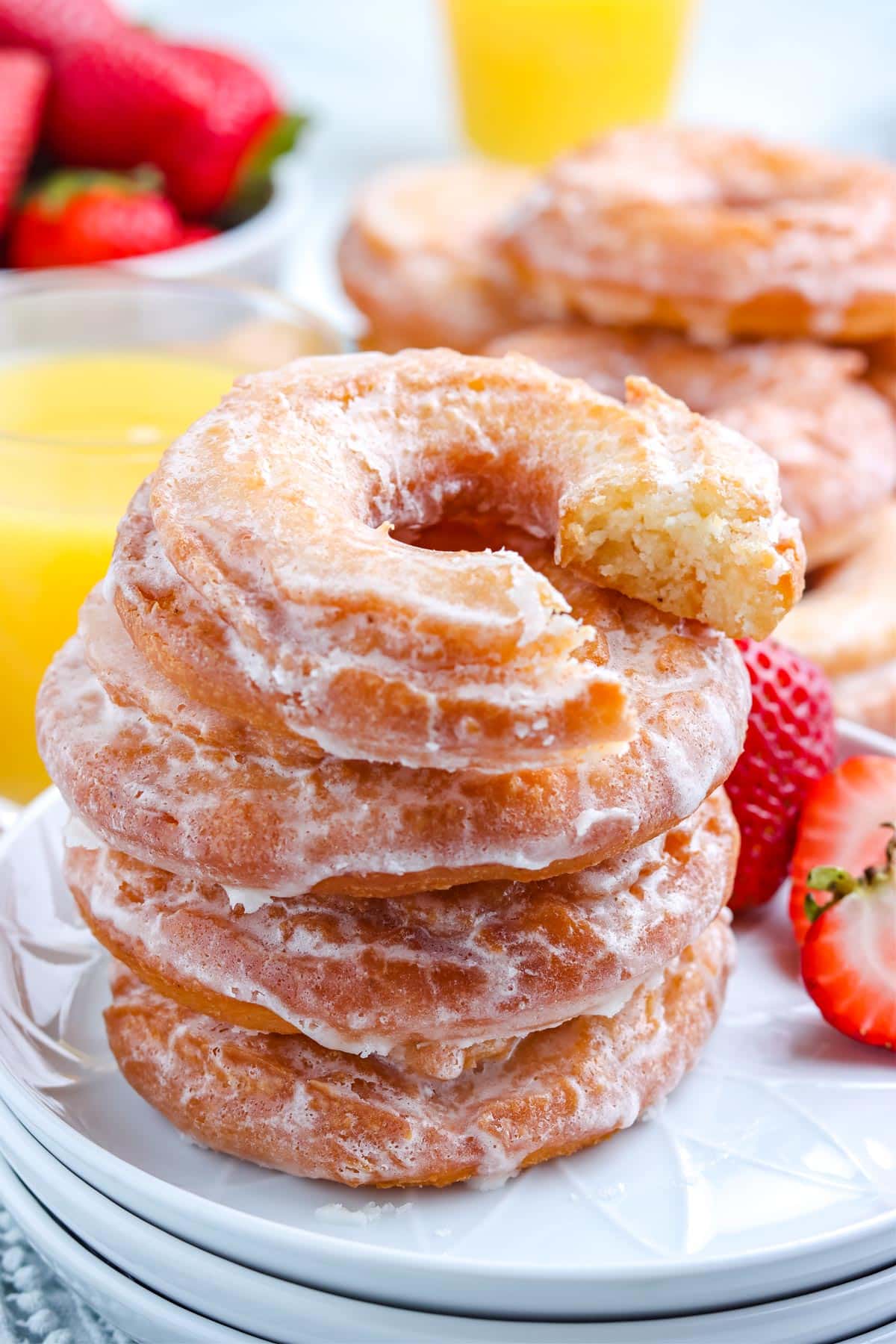 A close up picture of a stack of Old Fashioned Sour Cream Donuts.