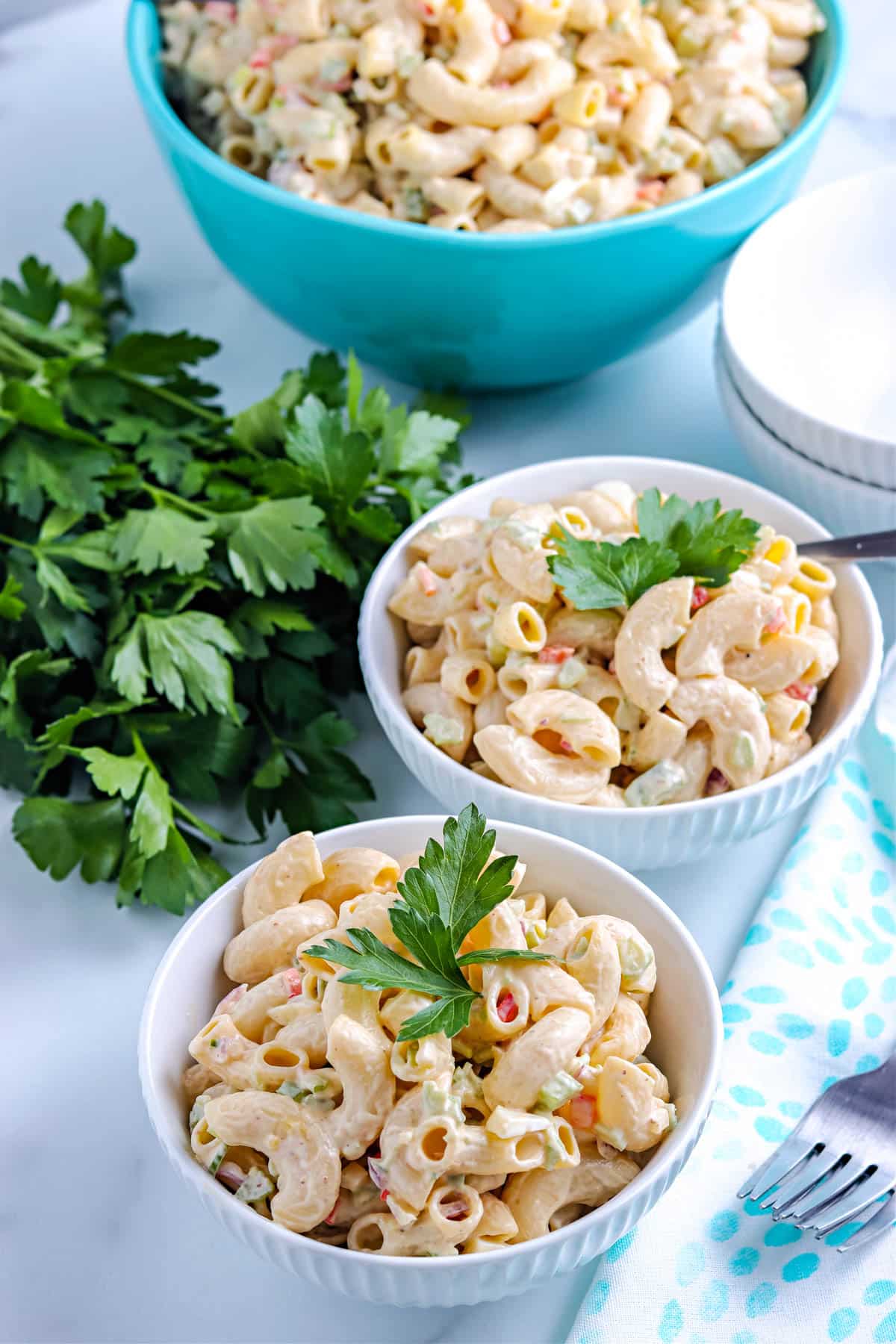 The finished Deli Style Macaroni Salad Recipe in white bowls.