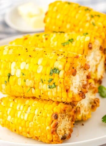 A close up picture of the finished air fryer corn on the cob.