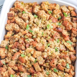 A close up picture stuffing in a casserole dish.