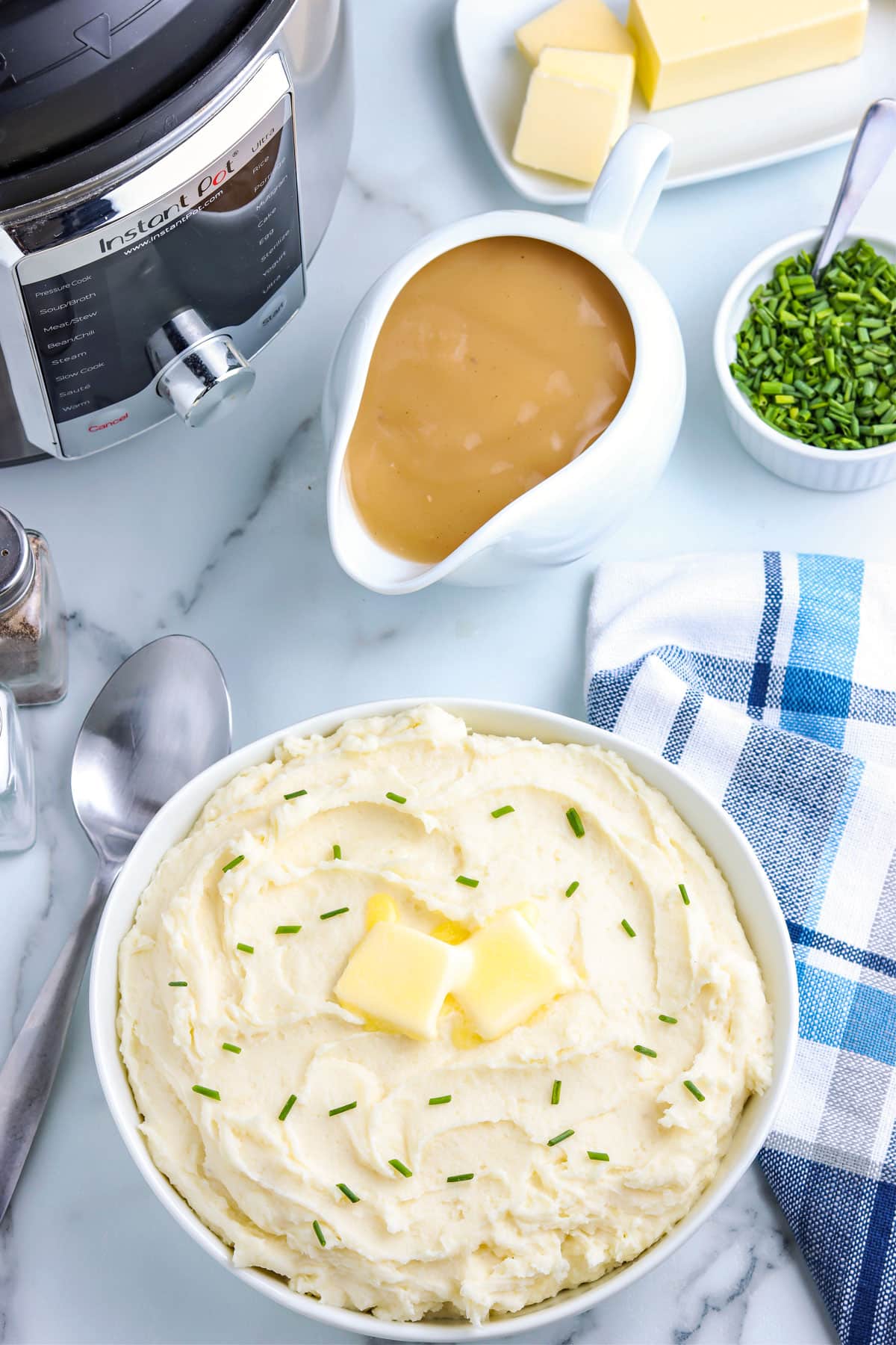 Mashed Potatoes made in an instant pot in a serving bowl.
