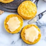A Pumpkin Biscuits cut in half so you can see the interior of the biscuit.