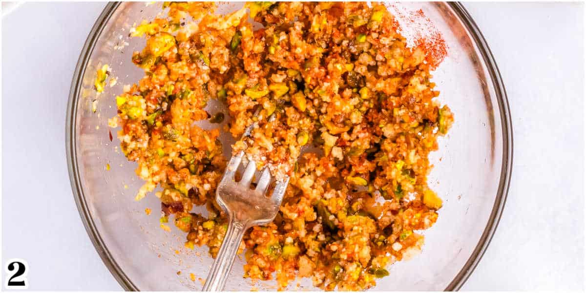 The pistachio topping mixed together in a bowl.