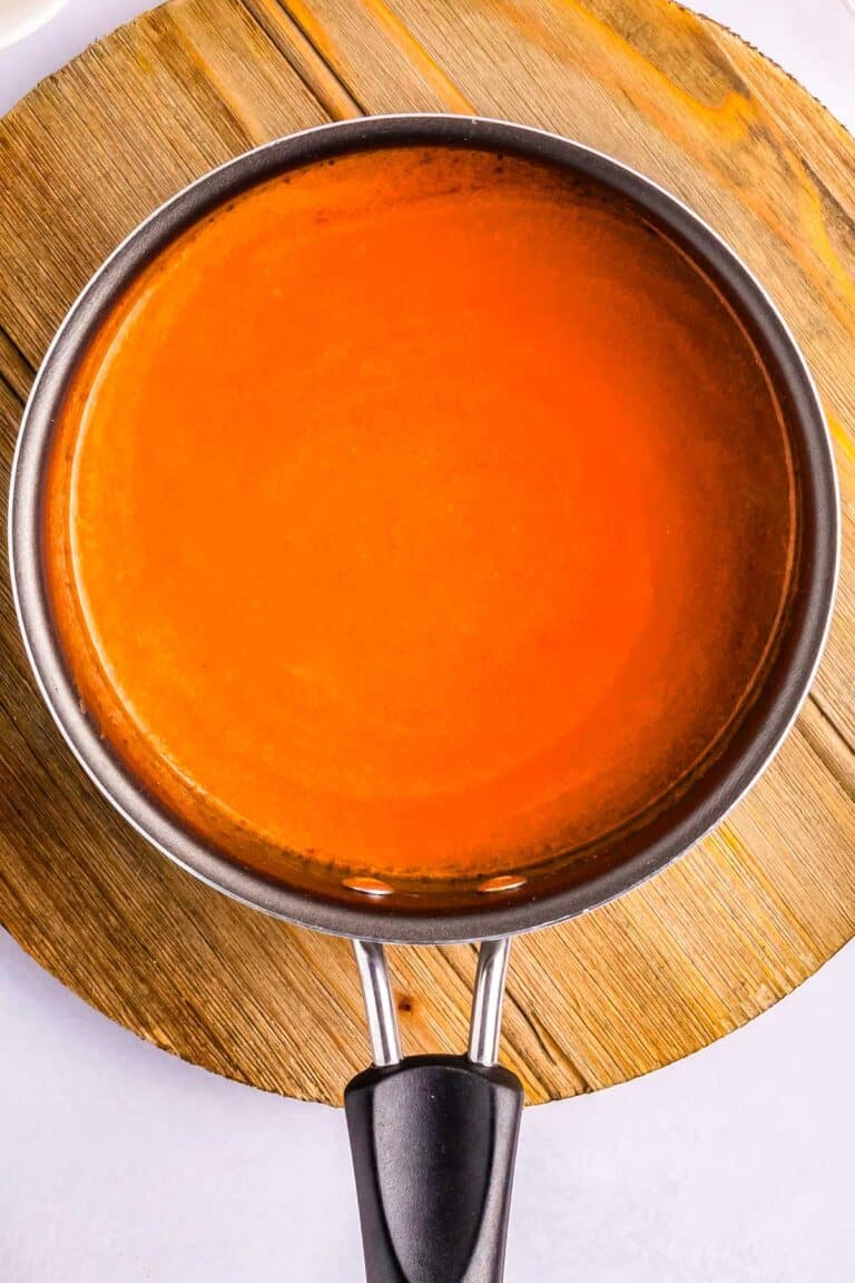 Buffalo Sauce in a saucepan.