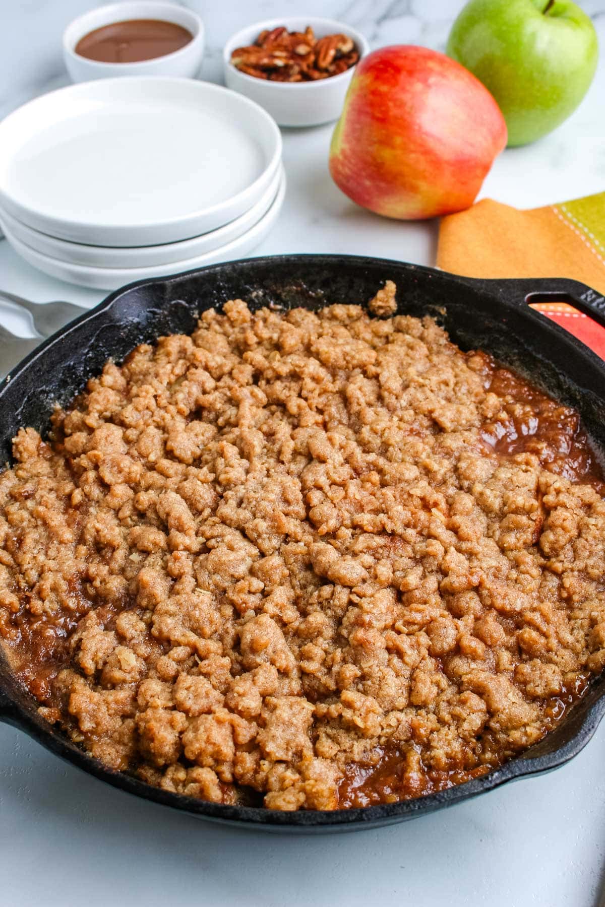 Smoked apple crisp in a cast iron skillet.