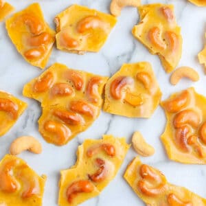 The finished Cashew Brittle recipe on a countertop.