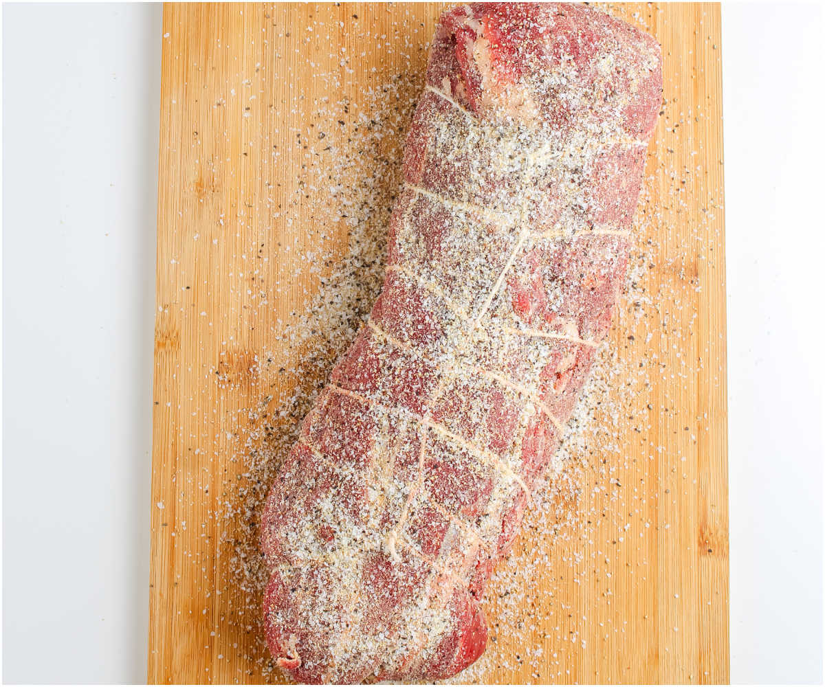 The tenderloing rubbed with seasonings.