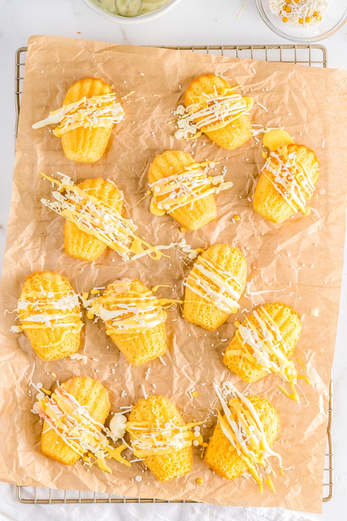 The finished Lemon Madeleines on a piece of brown parchment paper.