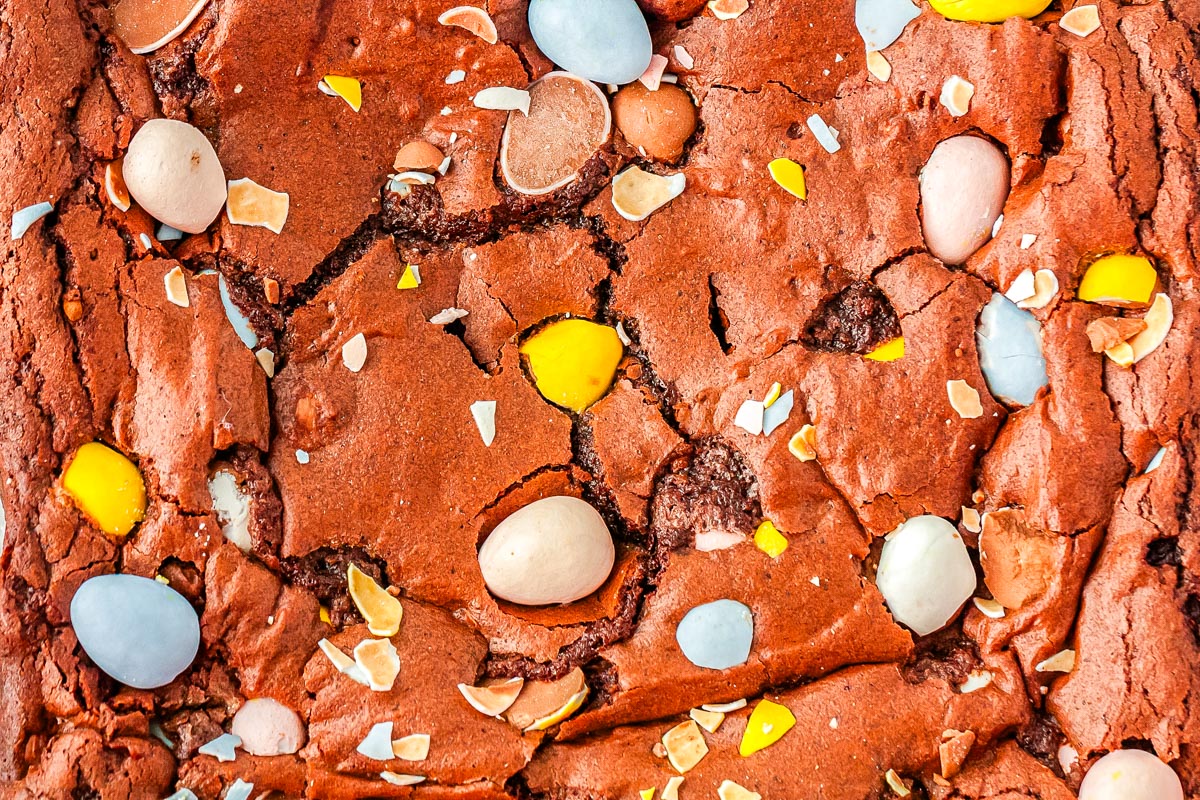 A close u of the finished brownies so you can see the crackly top and fudgey interior.