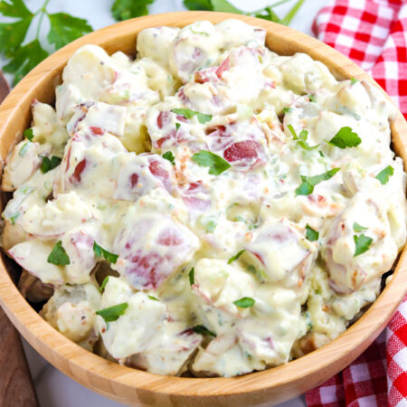 No egg potato salad in a wooden serving bowl.