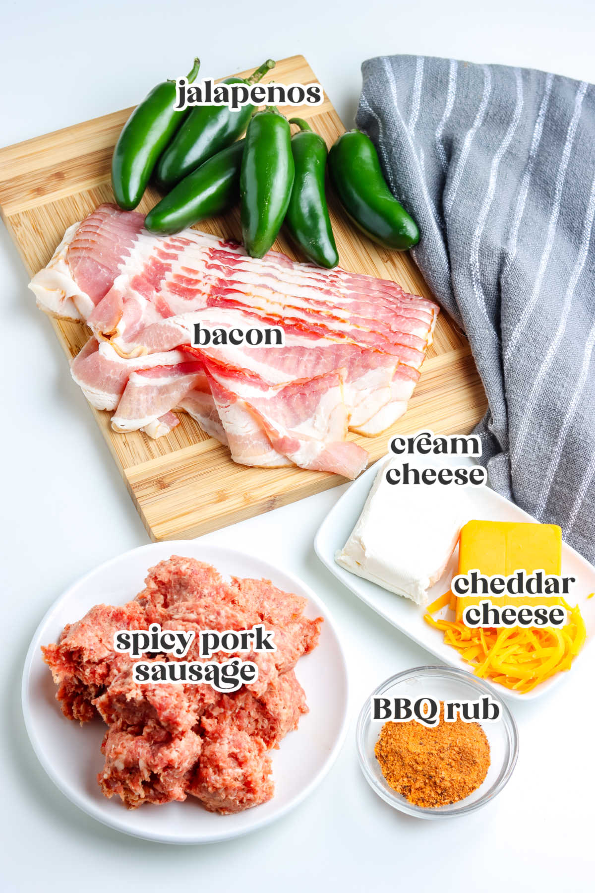The Smoked Armadillo Eggs recipe ingredients with text overlay labeling each.