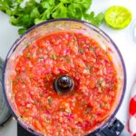 The smoked salsa in a food processor after it's been blended.