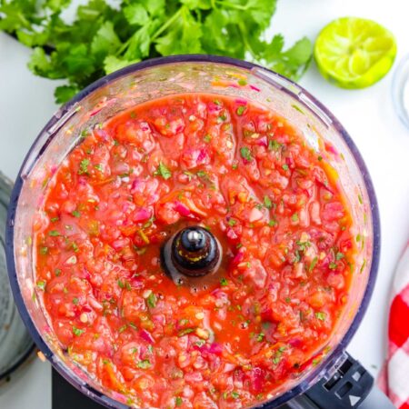 The smoked salsa in a food processor after it's been blended.